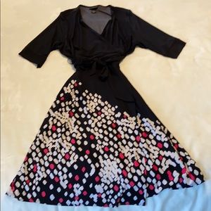 Black and pink jersey knit wrap dress